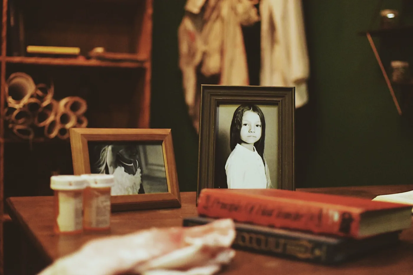Framed photographs on a desk